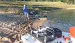 Aeration equipment being prepared for installation on a small private lake that is being stocked with fish.